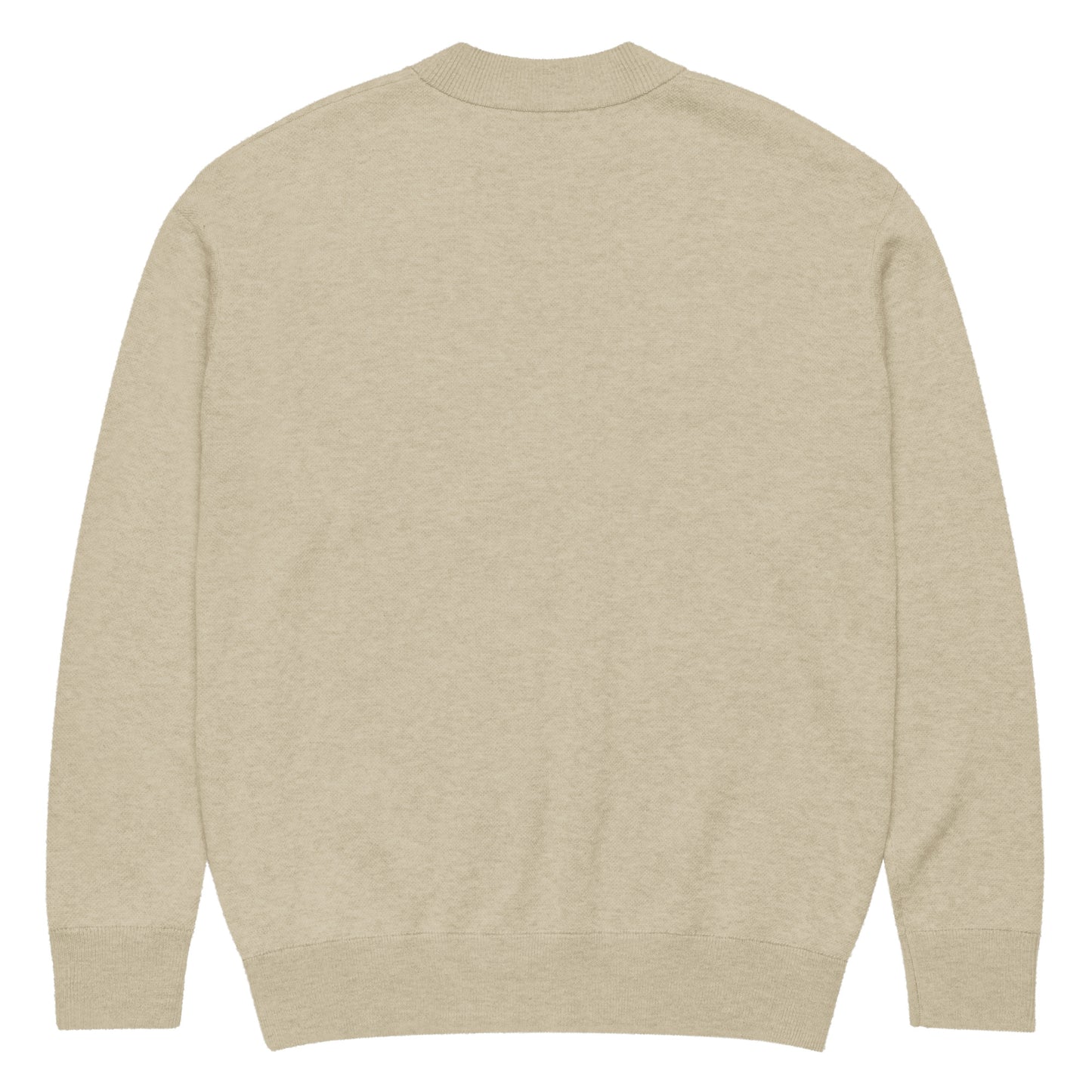 Parte trasera del cárdigan KÖNE beige mostrando acabado liso y estructura de punto uniforme.