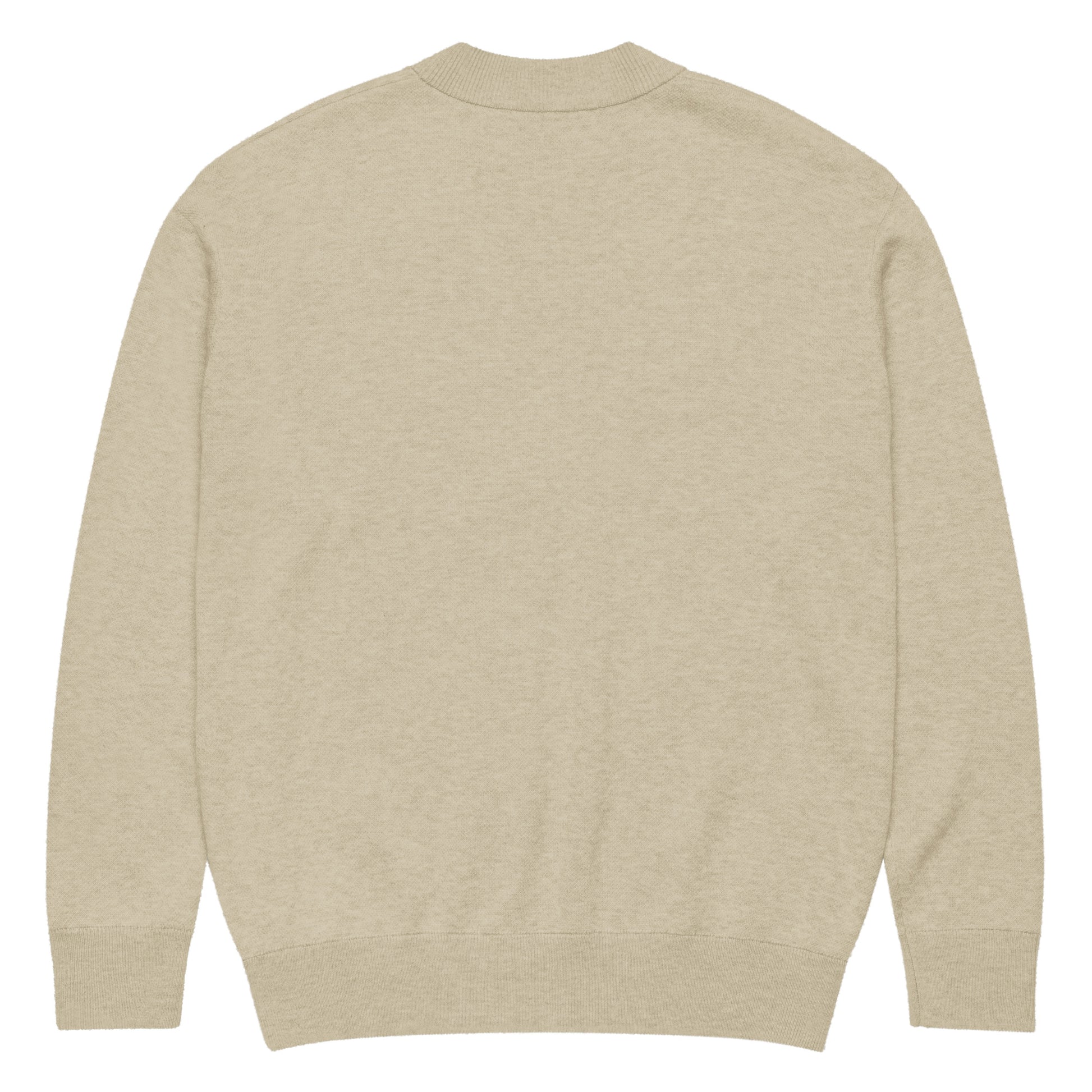 Parte trasera del cárdigan KÖNE beige mostrando acabado liso y estructura de punto uniforme.