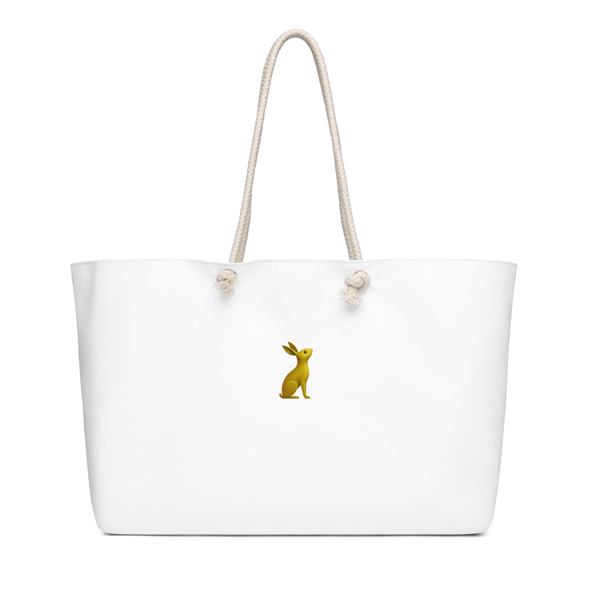 Bolsa KÖNE Weekender color blanco con logotipo dorado vista frontal, asas de cuerda natural y fondo neutro.